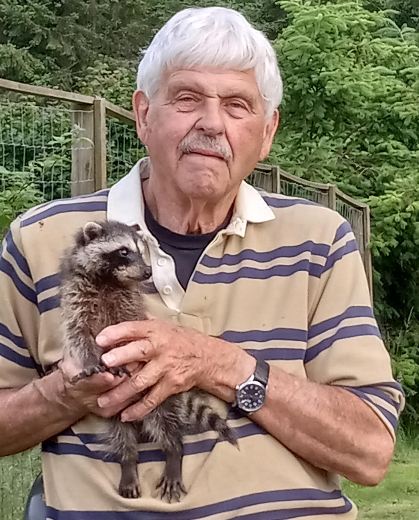 Ralph holding a young Roxy